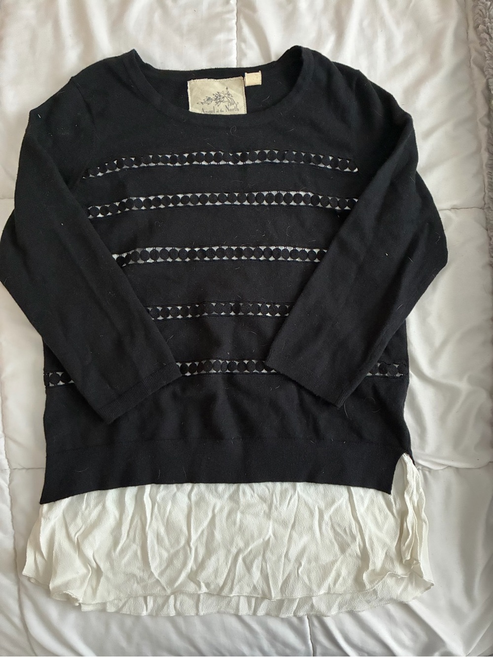 Angel Of The North Black Sweater with Cream Layered Hem